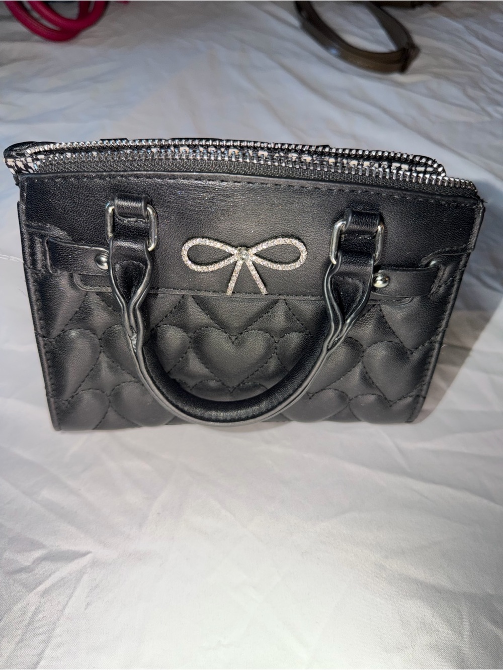 Elegant Black Quilted Satchel with Bow Accent